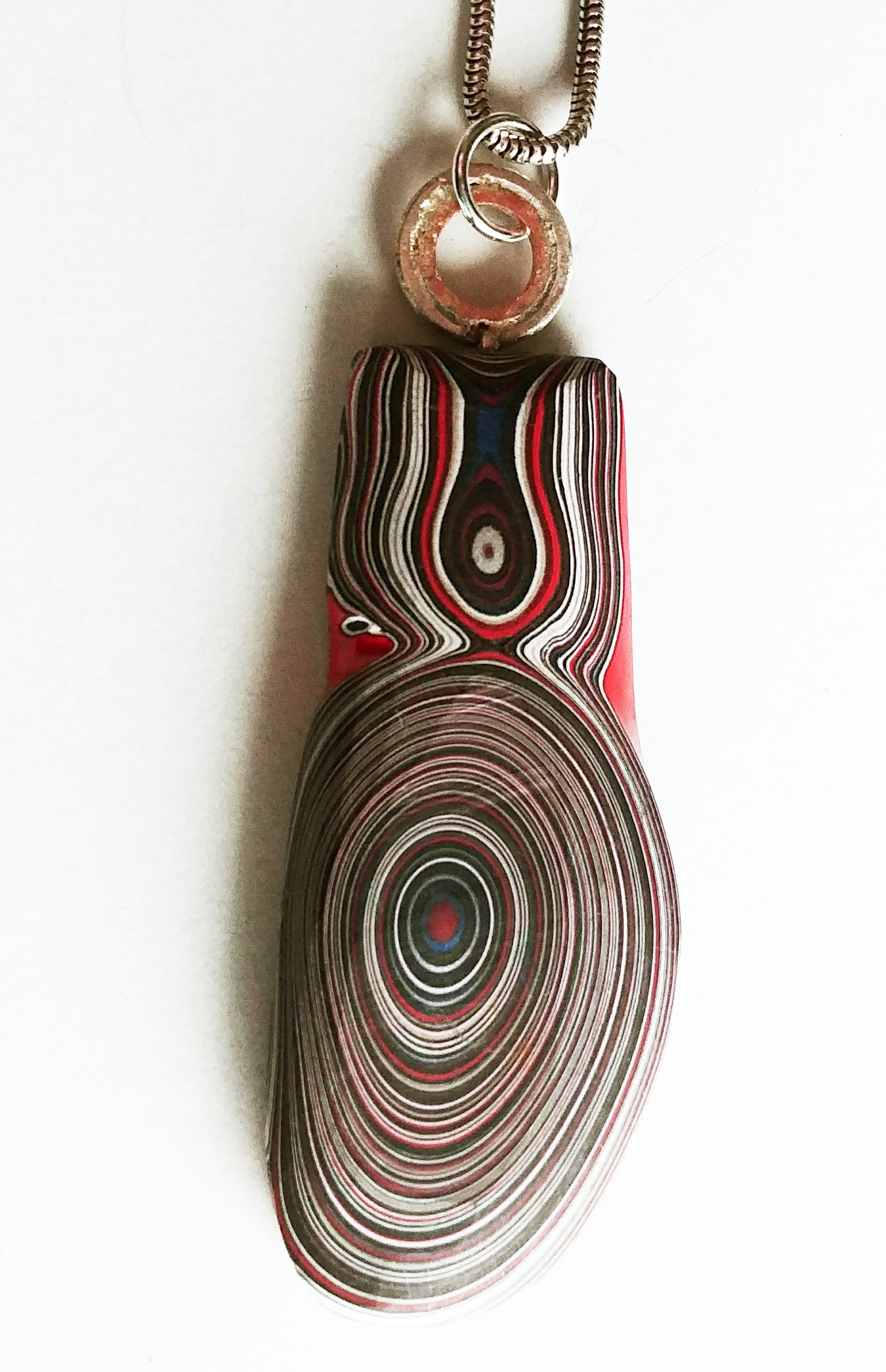 Thumb Fordite Front Red